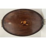 An Edwardian mahogany gallery tray of oval form with brass handles,