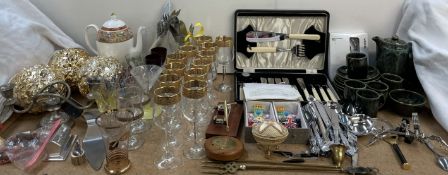 A set of twelve gilt decorated wine glasses together with other drinking glasses, candelabra,