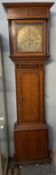 A 19th century oak and mahogany longcase clock,