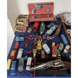 Assorted model cars including Dinky and Corgi together with and replica hand guns etc