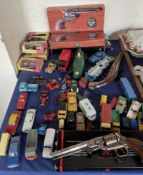 Assorted model cars including Dinky and Corgi together with and replica hand guns etc