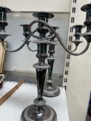 A pair of electroplated twin branch candelabra