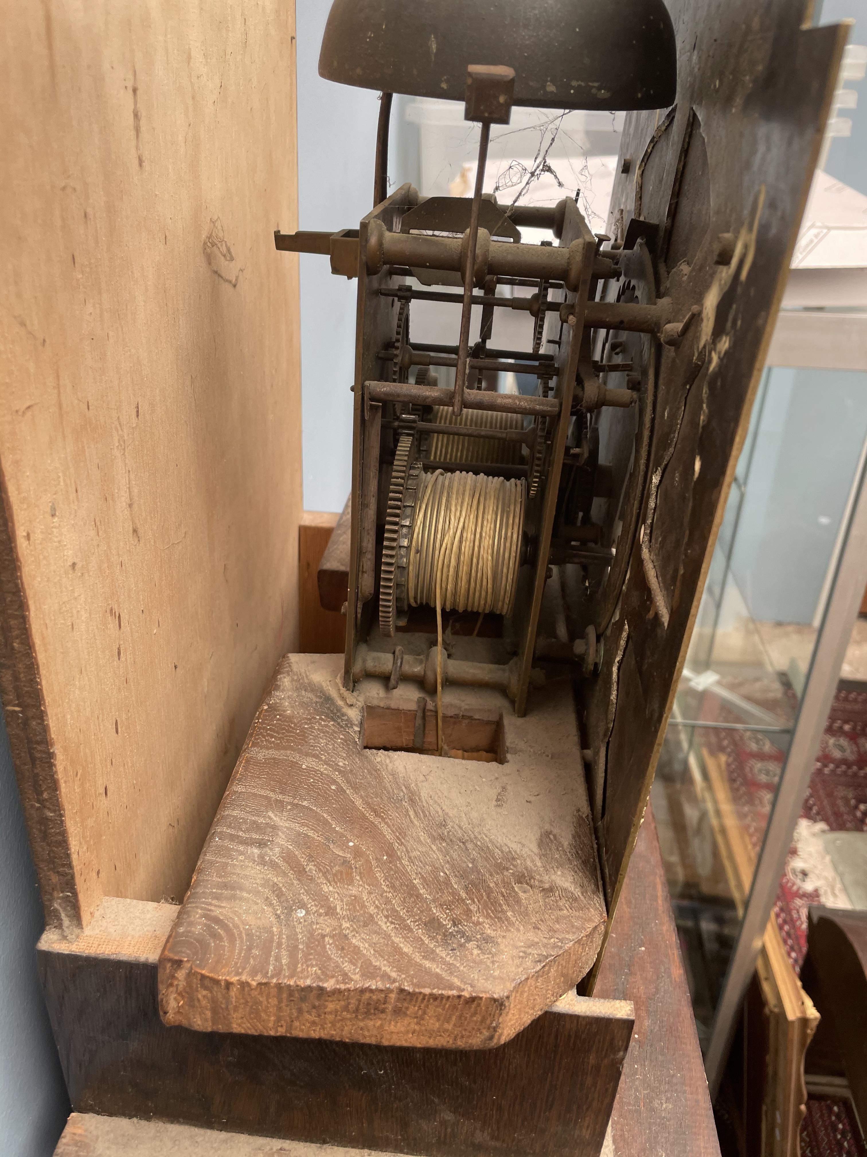 A 19th century oak longcase clock, the domed hood above a long trunk door with ogee arch, - Image 4 of 5