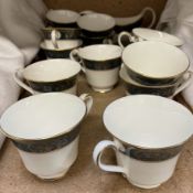 A Royal Doulton Carlyle pattern part tea set comprising fourteen tea cups, two cereal bowls,