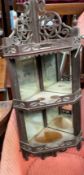 An Edwardian mahogany hanging shelves