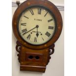 A Victorian walnut drop dial wall clock, the circular enamel dial with Roman numerals inscribed X.