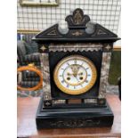 A Victorian black slate mantle clock, of architectural form,