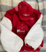 A Coca Cola bomber jacket,