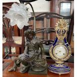 A Louis XV style clock with a sun surmount together with a Cavalier table lamp