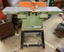 A DeWalt DW50 Planer - Thicknesser, on a stand, untested, sold as seen,