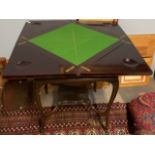 An Edwardian mahogany envelope card table,