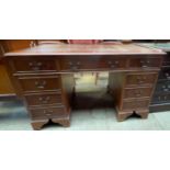 A reproduction yew pedestal desk,