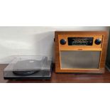 A Murphy walnut cased radio, with bakelite dials,