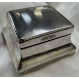 A George V silver cigarette box of square form,