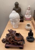 A Chinese soapstone brush pot together with seated buddhistic figures etc