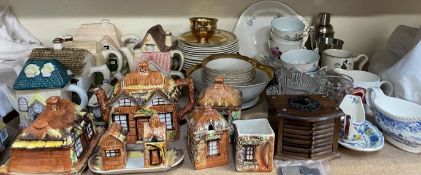 A cottageware part tea set together with other cottage ware teapots, other part tea sets,