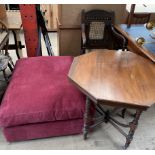 An upholstered foot stool together with an octagonal topped occasional table and a bergere armchair