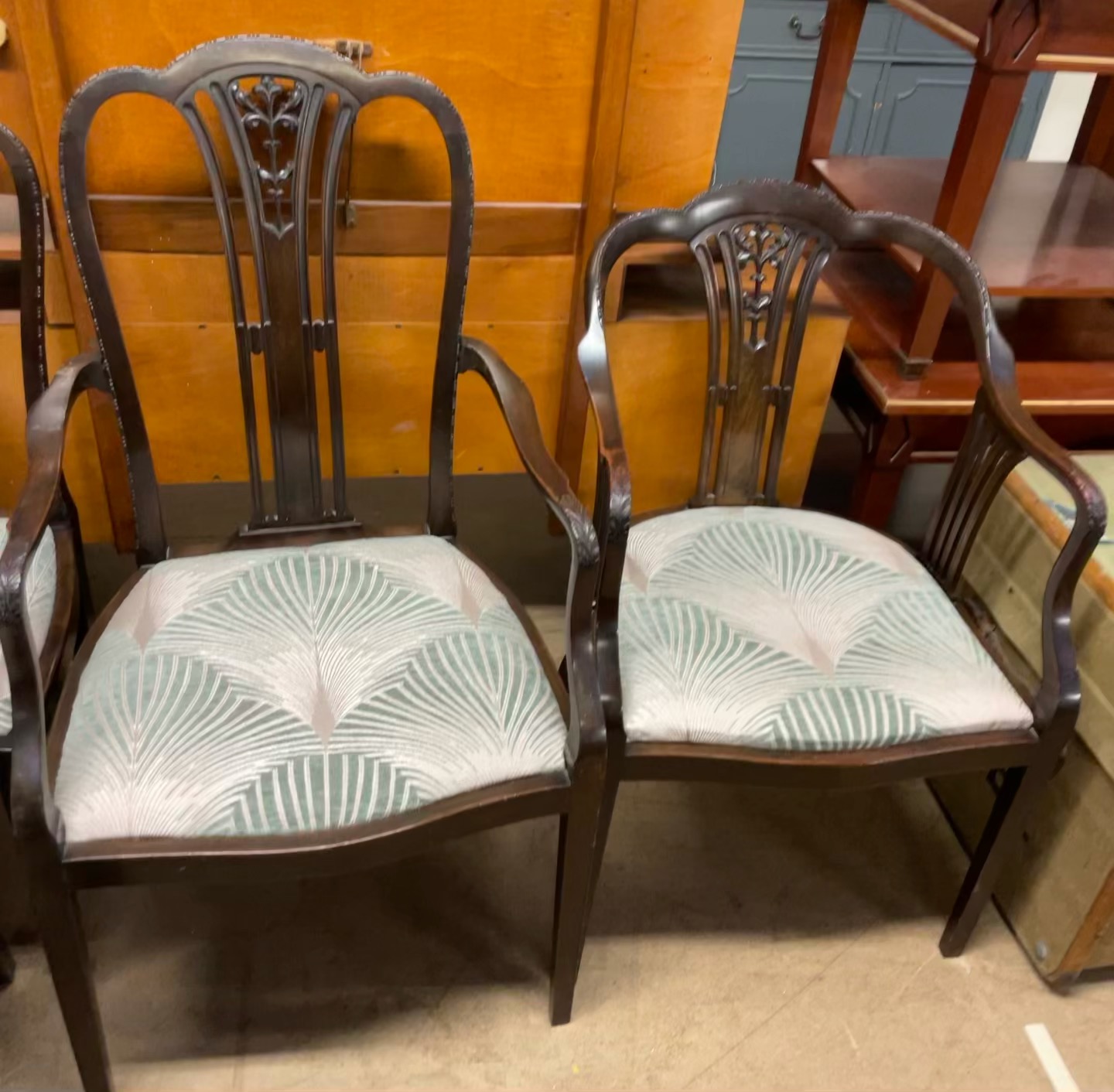 An Edwardian mahogany part salon suite comprising a Lady's chair,