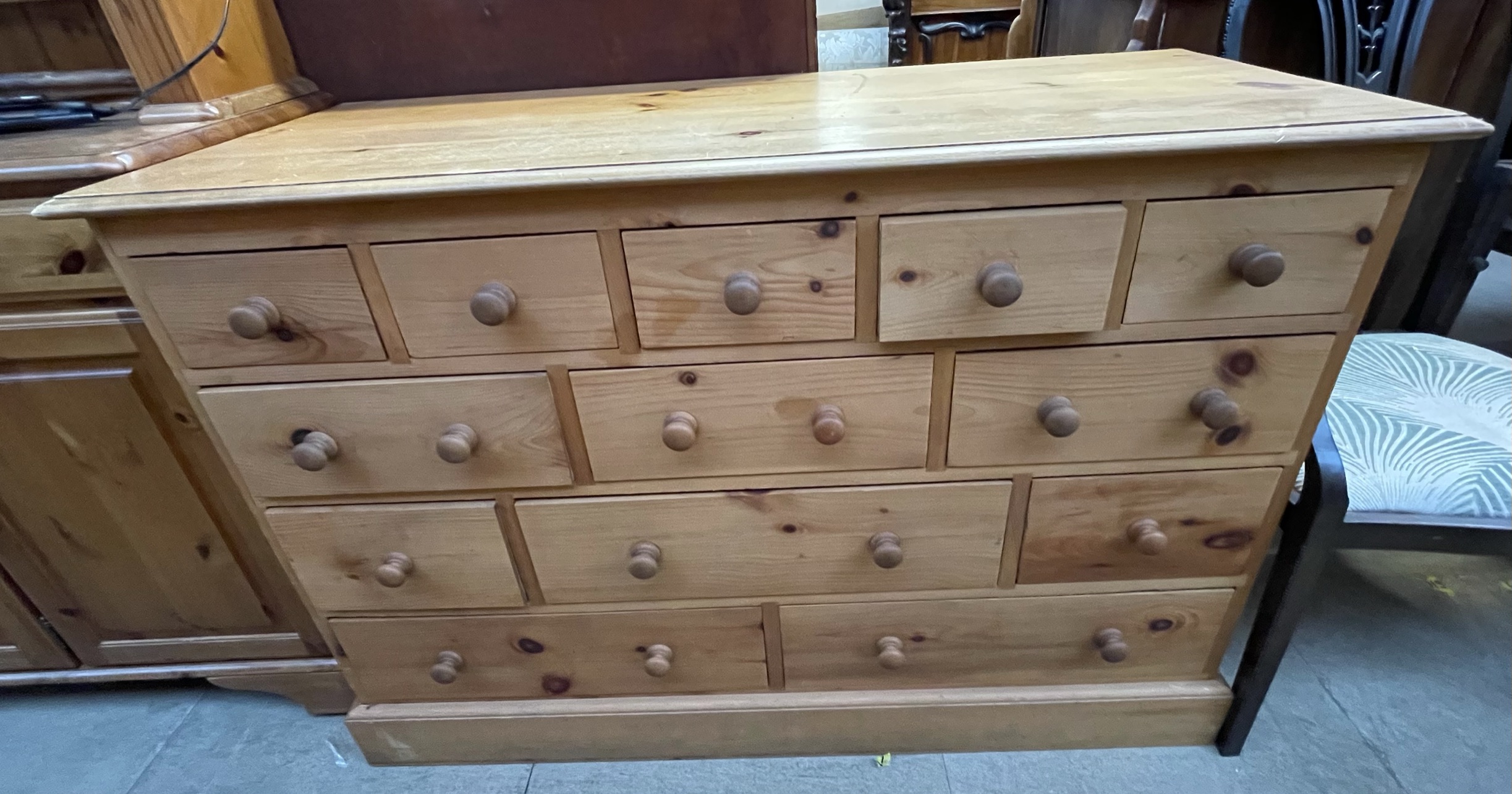 A modern pine dresser with a glazed top and cupboard base together with a pine chest of drawers - Image 2 of 2