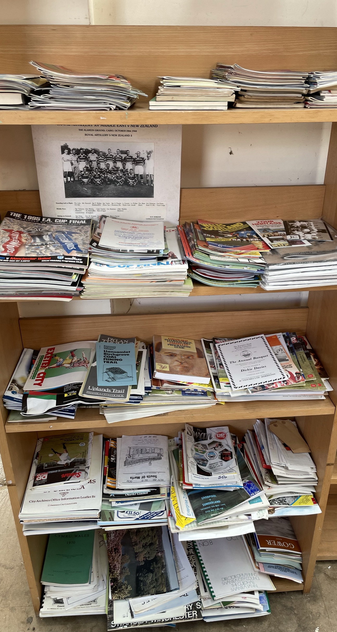 A collection of football programmes including Swansea city, FA Cup final programmes,