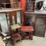 A 20th century walnut display cabinet together with a mahogany bookcase top, a nest of tables,
