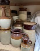 A collection of stoneware storage jars