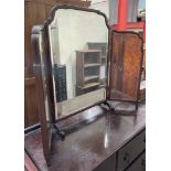 A walnut framed triptych dressing table mirror