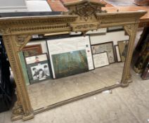 A gilt decorated overmantle mirror,