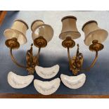 A pair of gilt metal twin branch wall lights together with a set of four continental porcelain