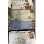 A collection of Victorian letters and envelopes with Penny red stamps