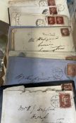 A collection of Victorian letters and envelopes with Penny red stamps