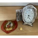 A silver framed desk clock, together with a print of a miniature and a R.C.A.F.