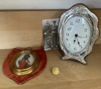 A silver framed desk clock, together with a print of a miniature and a R.C.A.F.