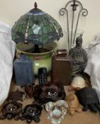 A Tiffany style table lamp together with pottery tortoises, glass vase,