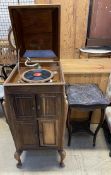 A walnut gramophone cabinet together with a carved and stained occasional table