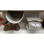 A white painted weighing scales together with a shop scales