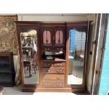 An Edwardian mahogany triple wardrobe,