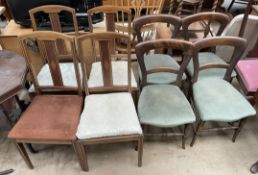 A set of four Edwardian mahogany salon chairs together with a set of four Victorian mahogany salon