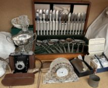 A Viners stainless steel cased part flatware service together with a Waterford crystal desk clock,