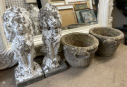 A pair of reconstituted stone lion statues together with a pair of planters
