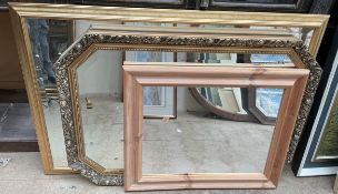 A rectangular gilt wall mirror together with two other wall mirrors