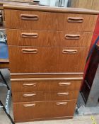 A pair of mid 20th century teak chest of drawers