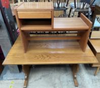 An oak refectory dining table together with a teak telephone table