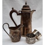 A George V silver hot water pot,