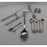 A pair of Victorian silver asparagus servers with pierced blades and fiddle pattern handles, London,