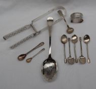 A pair of Victorian silver asparagus servers with pierced blades and fiddle pattern handles, London,