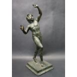 A bronze figurine of "The dancing Faun" on a stepped square base, after the antique, 31.