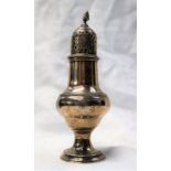 A George III silver caster, with a flame finial,