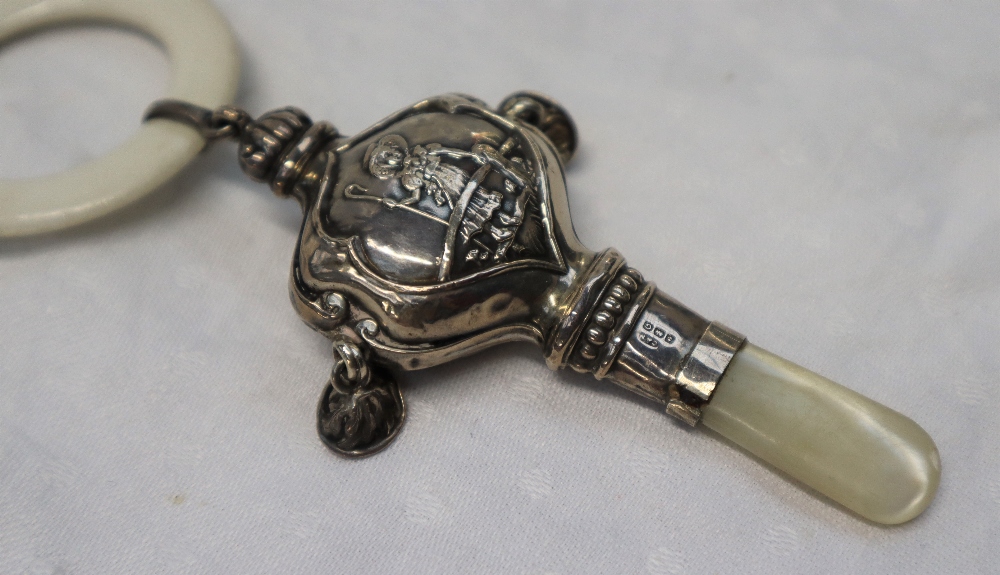 A George V silver and mother of pearl baby's rattle, with a white plastic teething ring, - Image 4 of 5