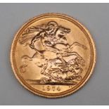 An Elizabeth II gold sovereign dated 1974 CONDITION REPORT: 1974 Sovereign photos in